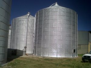 Steel silos recently rehabilitated and restored to optimal condition with fresh protective coatings
