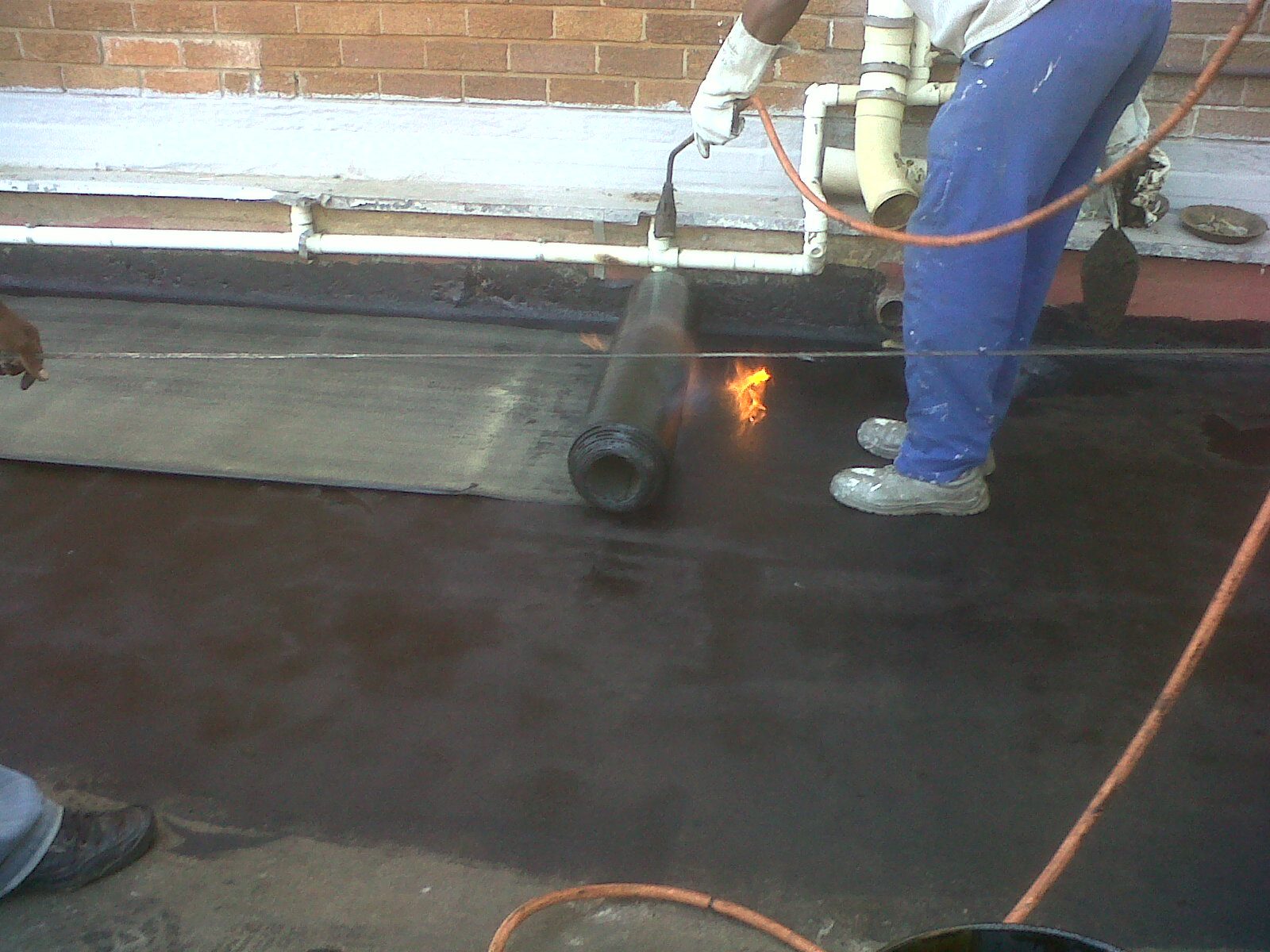 Torch-On Membrane Waterproofing Application by Delmos Construction